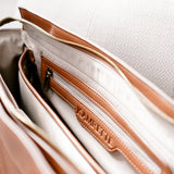 Inside of padded camera bag with secure zippers for extra storage