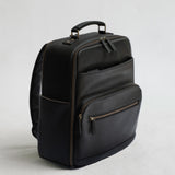 Lyra Camera Backpack - front view in black vegan leather
