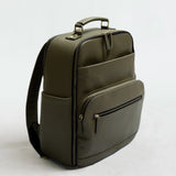 Lyra Camera Backpack - front view in olive vegan leather