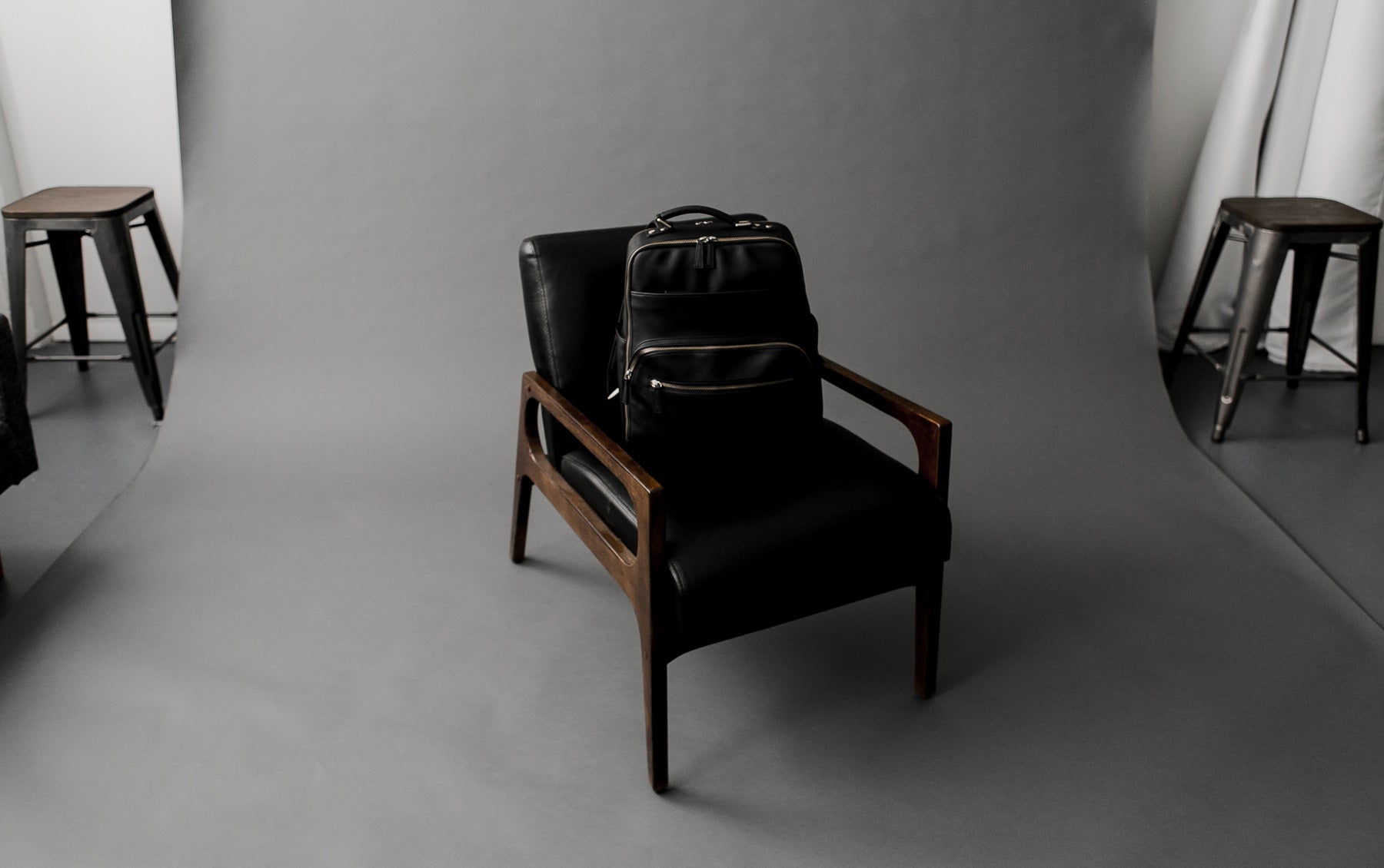Black Camera Bag on Chair