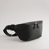 Versa Camera Crossbody - front view  of fanny pack in black vegan leather