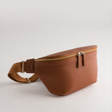 Versa Camera Crossbody - front view  of fanny pack in tan vegan leather
