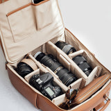 Lyra backpack open with DSLR, mirrorless camera, lenses and accessories