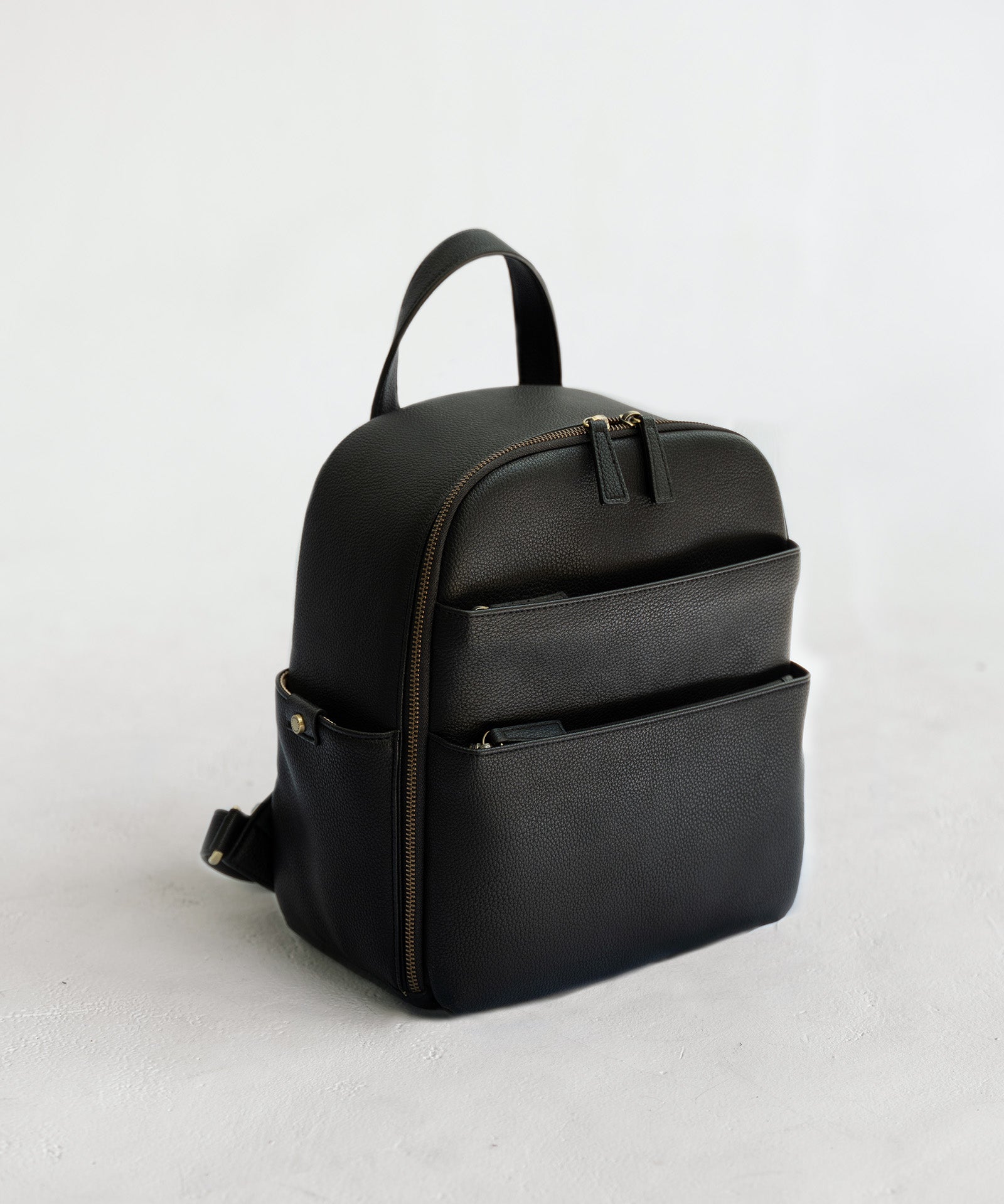 Mina camera backpack in black vegan leather - front view