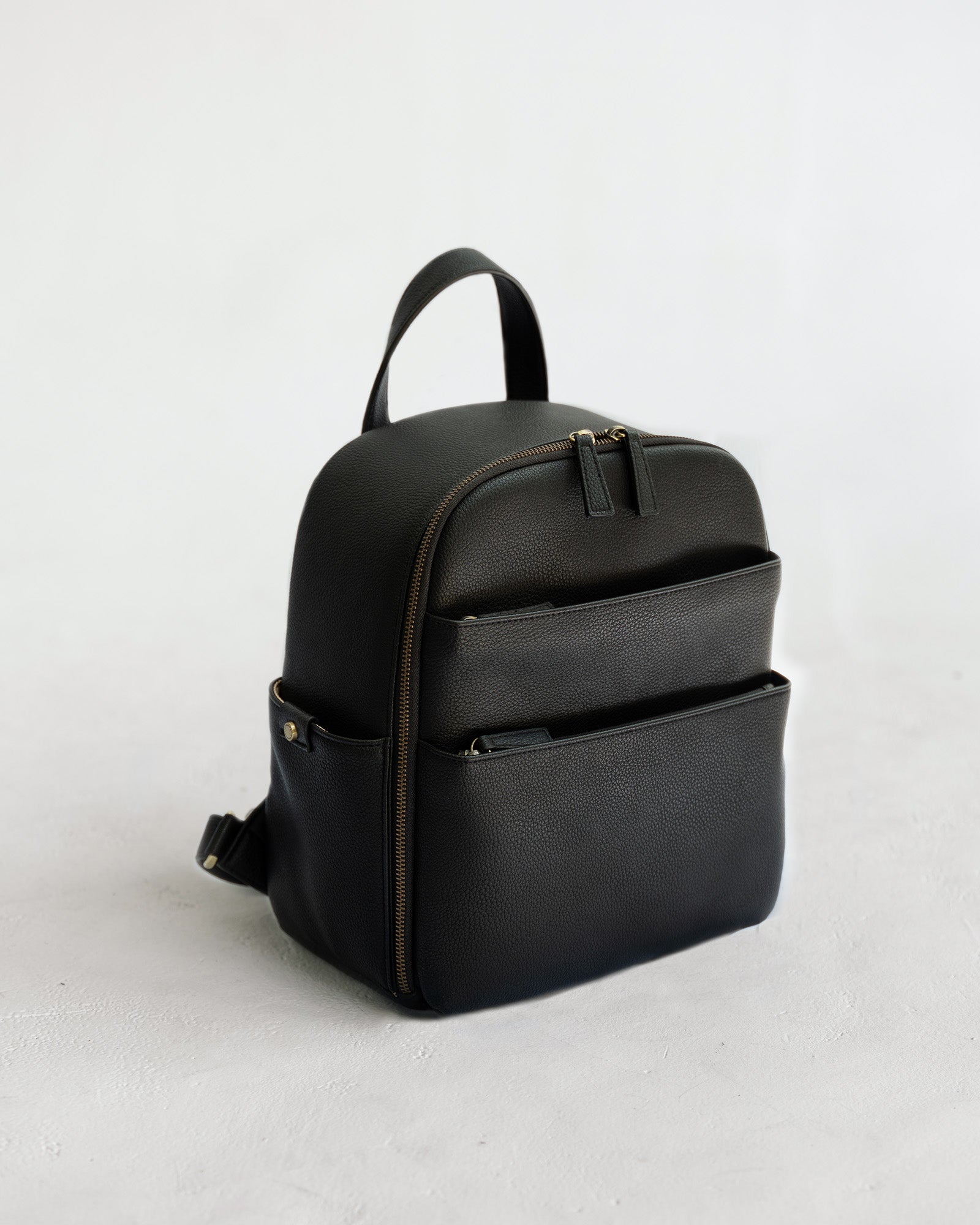 Mina camera backpack in black vegan leather - front view