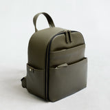 Mina camera backpack in olive vegan leather – front view